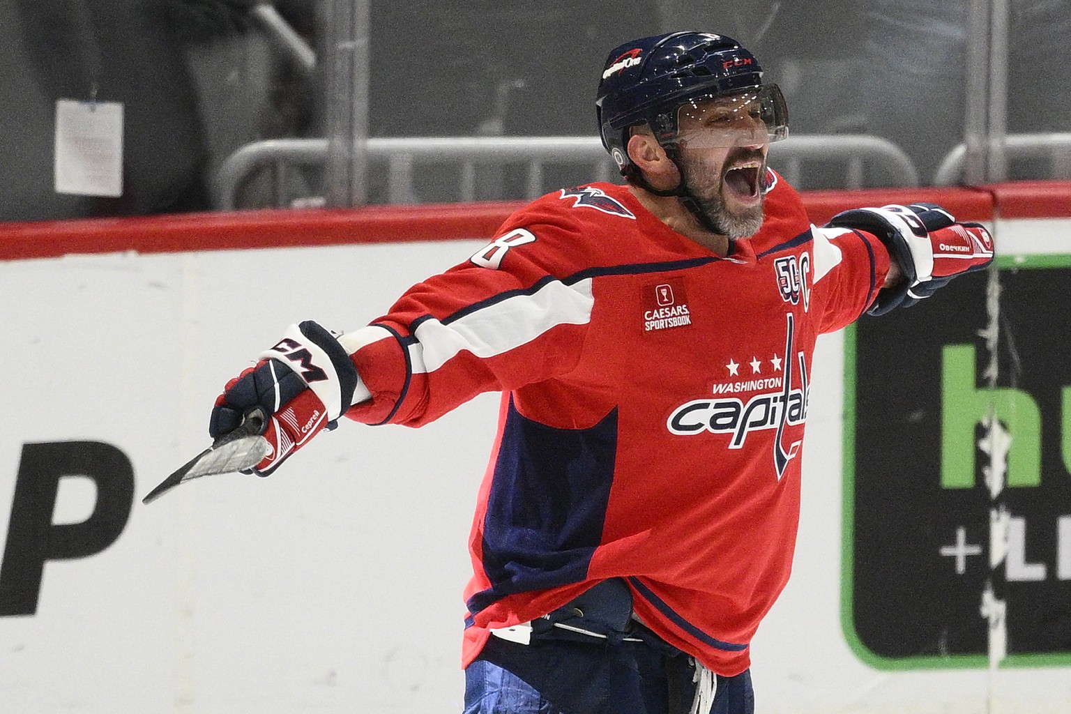 Washington Capitals left wing Alex Ovechkin (8) celebrating his 894th goal during the third period of an NHL hockey game against the Chicago Blackhawks, Friday, April 4, 2025, in Washington. (AP Photo ...