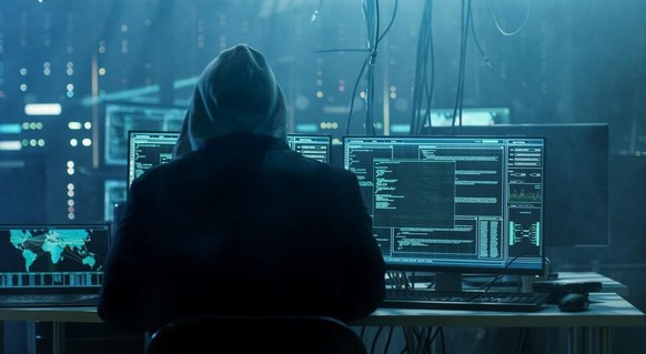 hacker hacking cybercrime cyber-kriminalität symbolbild