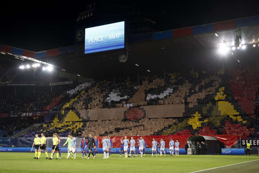 epa10227761 Basel supporters perform a choreography as players enter the pitch for the UEFA Europa Conference League group H soccer match between FC Basel 1893 and SK Slovan Bratislava in Basel, Switz ...