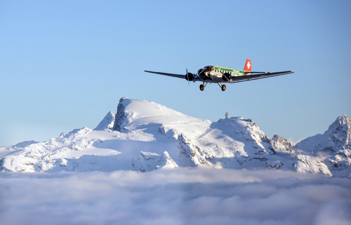 epa06928797 A undated handout photo made available by Swiss JU-AIR showing a historic JU-52 aircraft of the JU-AIR in the air. A JU-52 of the JU-AIR crashed on 04 August 2018 at Piz Segnas above Flims ...