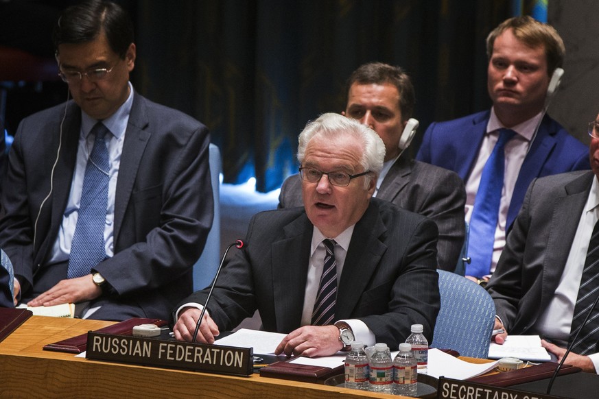 Russia&#039;s Ambassador to the United Nations Vitaly Churkin (C) addresses the U.N. Security Council at the U.N. headquarters in New York July 18, 2014. Churkin warned the U.N. Security Council on Fr ...