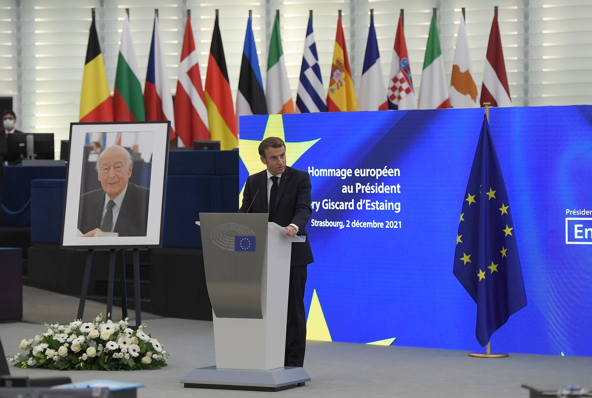 epa09616451 French President Emmanuel Macron speaks during a ceremony in tribute to former President Valery Giscard d'Estaing, on the first anniversary of his decease, at EU Parliament in Strasbo ...