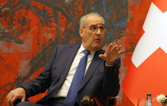 epa12918460 President of the Swiss Confederation Guy Parmelin talks with Serbian President (not pictured) during their meeting in Belgrade, Serbia, 28 April 2026. President of the Swiss Confederation  ...