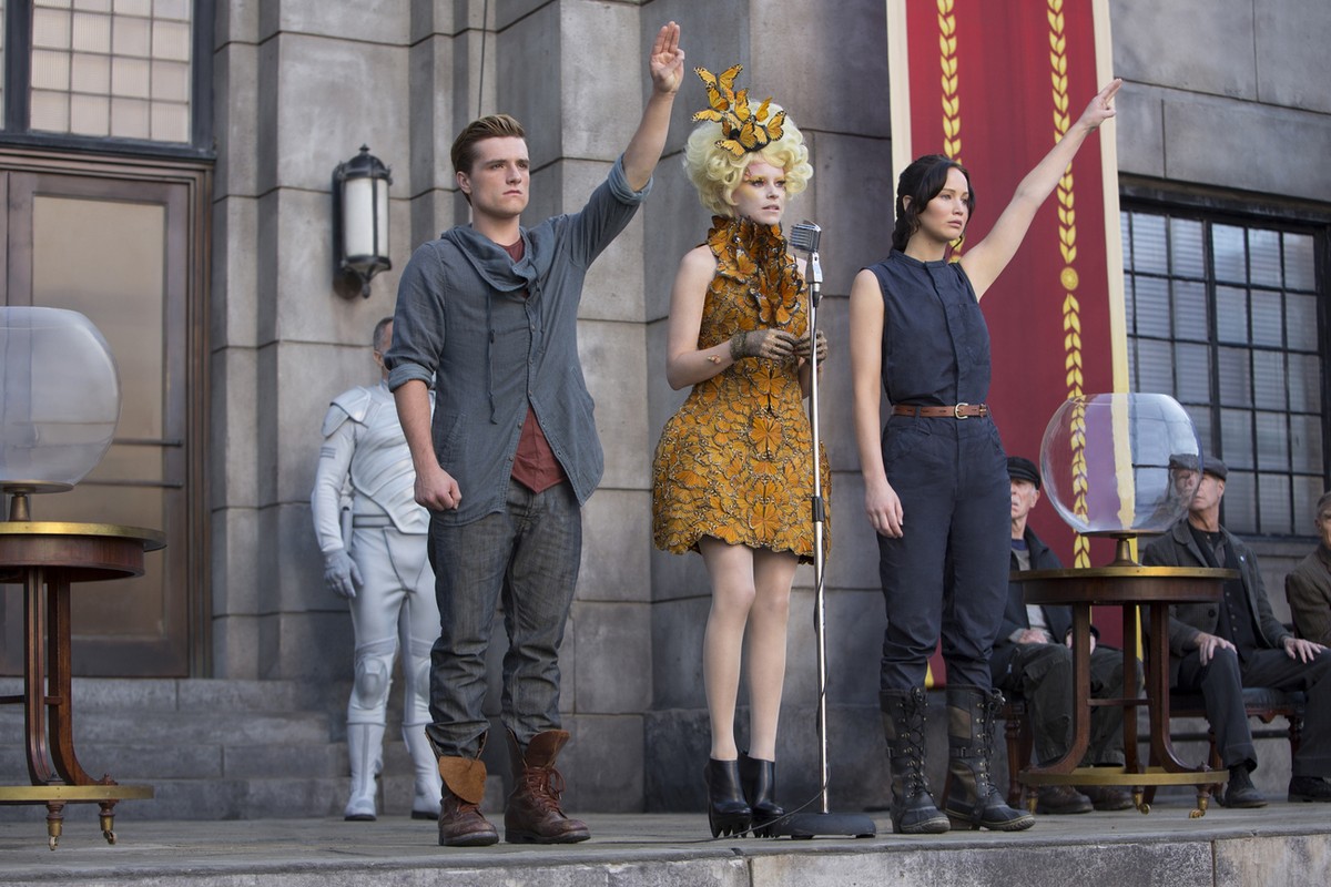 This image released by Lionsgate shows Josh Hutcherson as Peeta Mellark, from left, Elizabeth Banks as Effie Trinket and Jennifer Lawrence as Katniss Everdeen in a scene from "The Hunger Games: C ...