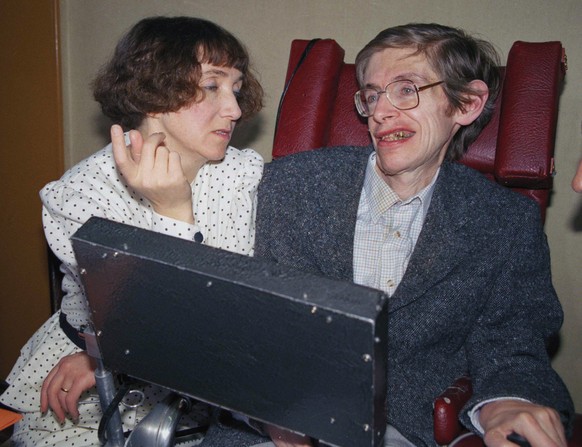 FILE - In this March 3, 1989 file photo British astrophysicist Dr. Stephen Hawking, 47, answers newsmen with the help of his computer and the assistance of his then wife Jane, in Paris. Hawking, who h ...