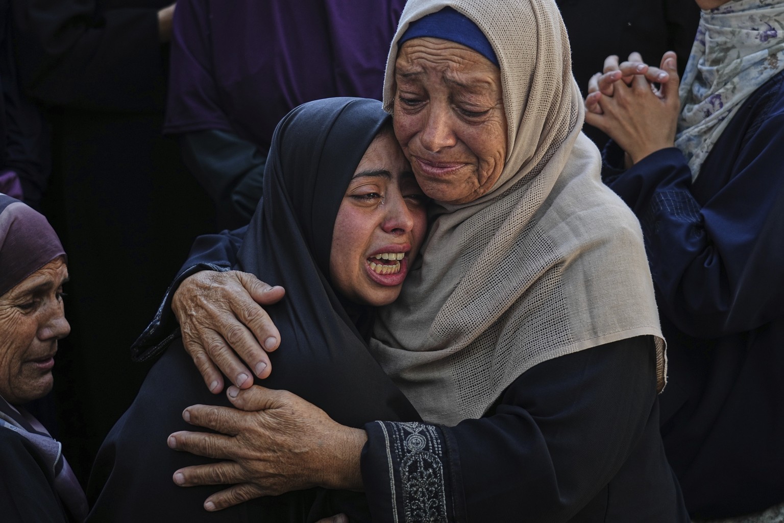 Relatives of Palestinians killed in Israeli strikes on the Gaza Strip mourn their deaths at Al-Shifa Hospital in Gaza City, Saturday, June 28, 2025. (AP Photo/Jehad Alshrafi)
Israel Palestinians