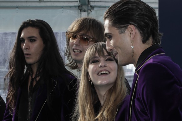 Musical group Maneskin from Italy pose for photographers upon arrival at the Turquoise Carpet event of the Eurovision Song Contest in Rotterdam, Netherlands, Sunday, May 16, 2021. (AP Photo/Peter Dejo ...