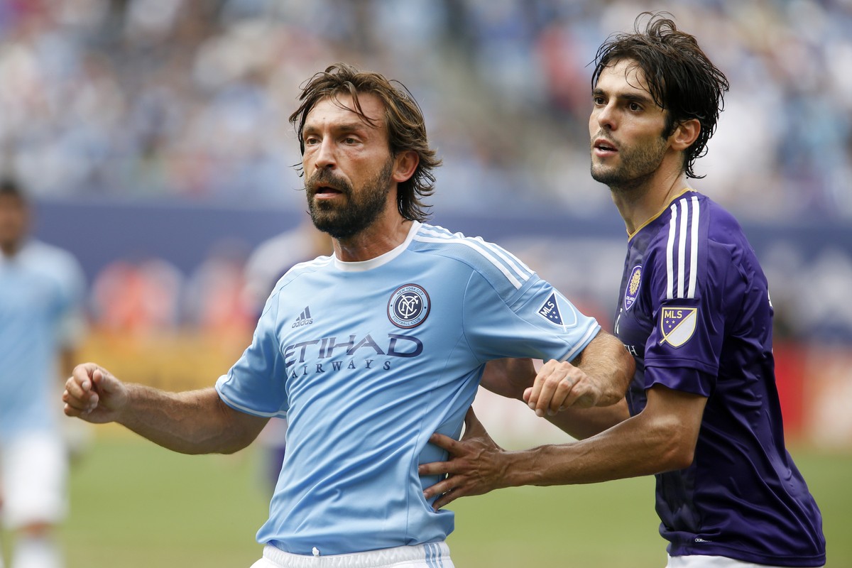 New York City FC's Andrea Pirlo, left, of Italy, battles for position against Orlando City SC's Kaka, of Brazil, during the second half of an MLS soccer game at Yankee Stadium, Sunday, July  ...