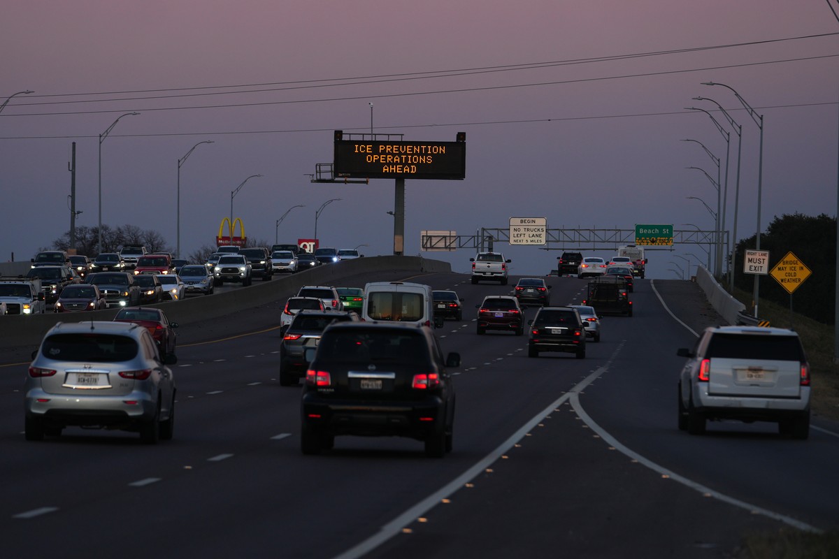 A sign visible from the eastbound lanes of Highway 121 warns of road preparations ahead of inclement weather expected in the region Wednesday, Jan. 21, 2026, in Fort Worth, Texas. (AP Photo/Julio Cort ...