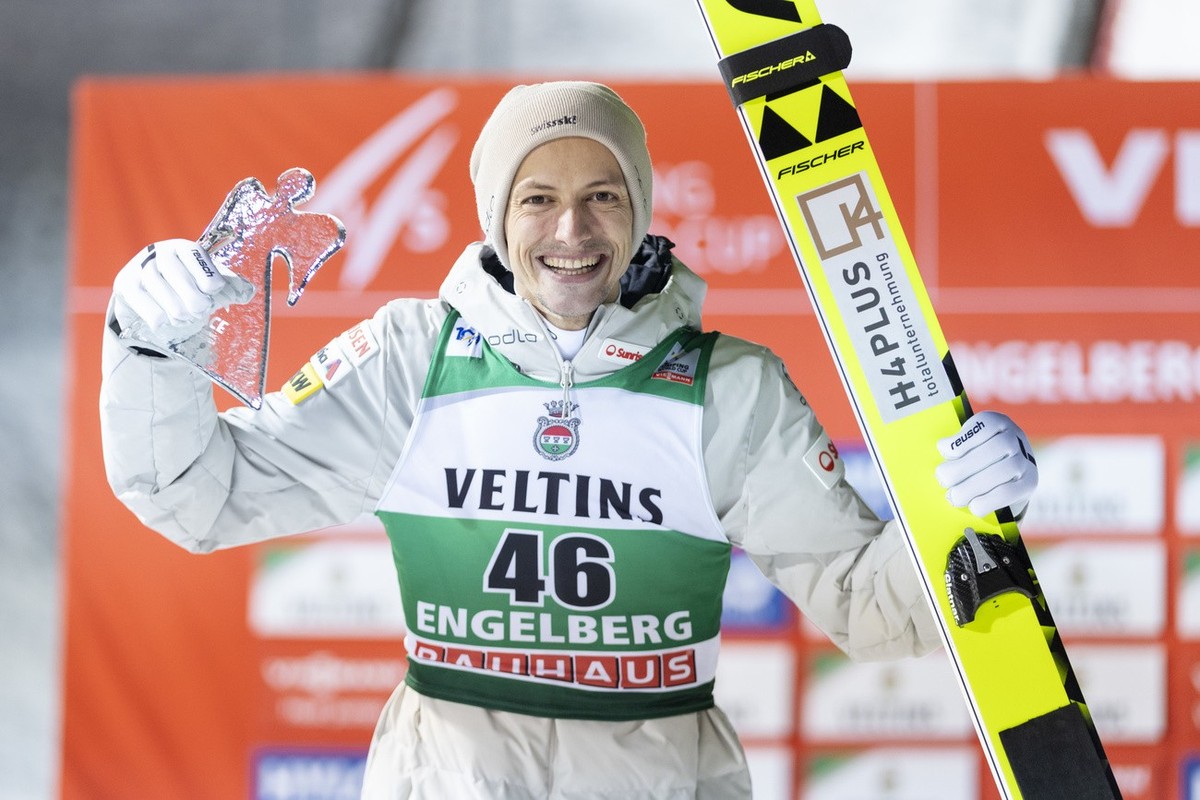 Gregor Deschwanden from Switzerland reacts at the winner ceremony at the men's FIS Ski Jumping World Cup at the Gross-Titlis Schanze on , Saturday, December 21, 2024 in Engelberg, Switzerland. (K ...