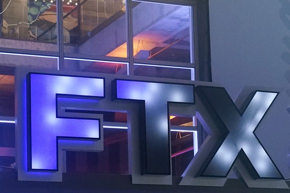 FILE - The FTX Arena logo is seen where the Miami Heat basketball team plays on Nov. 12, 2022, in Miami. The former CEO of failed crypto firm FTX Sam Bankman-Fried has been arrested in the Bahamas at  ...