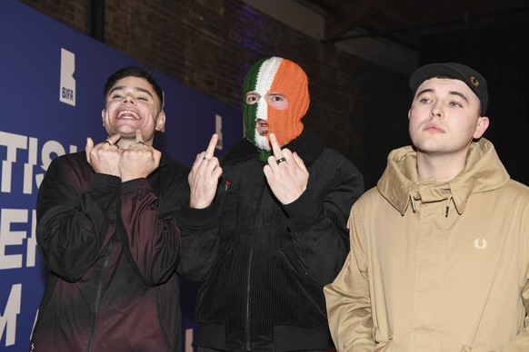 EDS NOTE: OBSCENITY - Naoise � Caireall�in, DJ Prova� and Mo Chara of Kneecap pose on arrival at the Britain Independent Film Awards on Sunday, Dec. 8, 2024, in London. (Photo by Thomas Krych/Invision ...