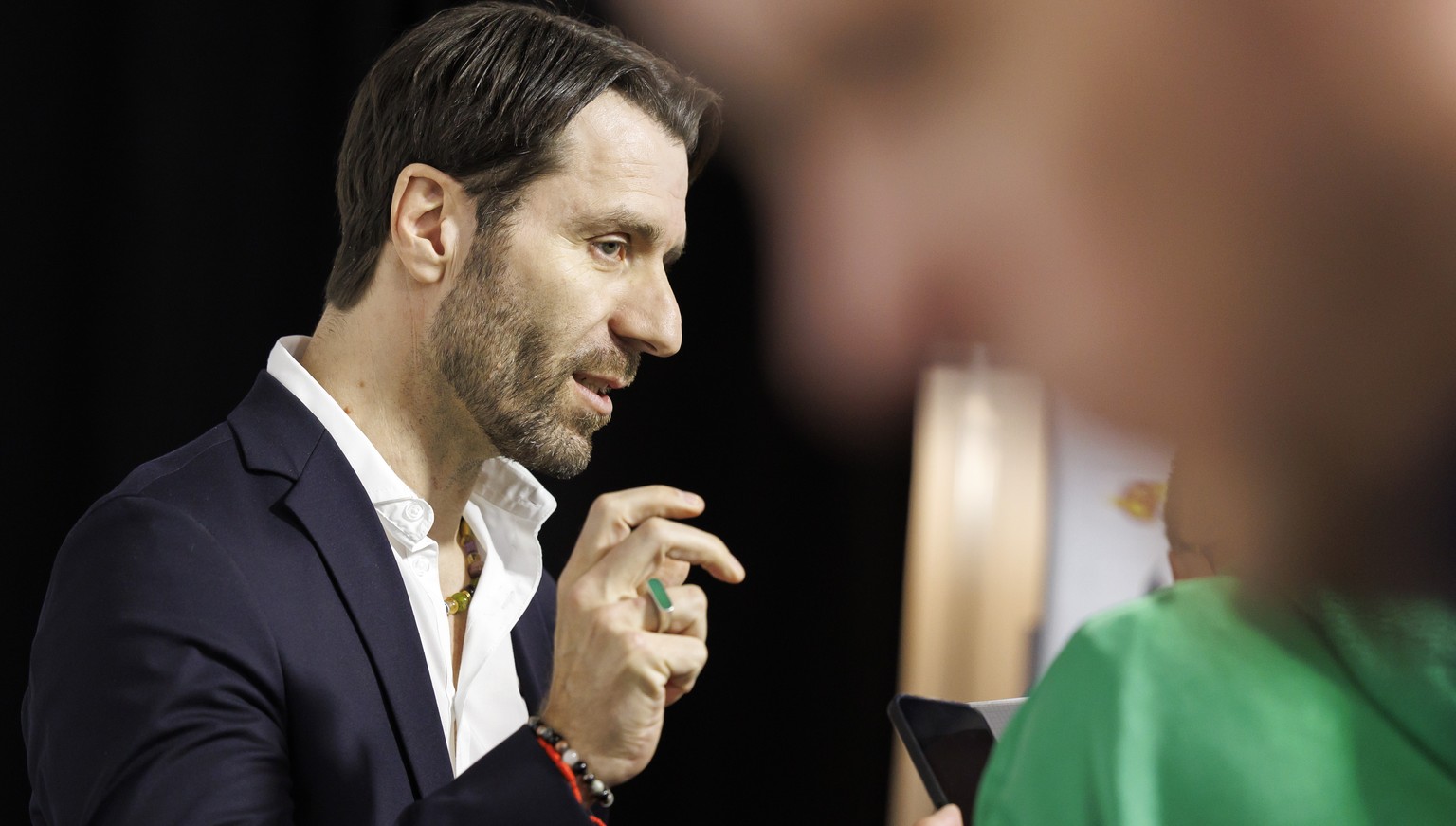 Lars Weibel, Director Sport of Swiss Ice Hockey Federation, talks to reporters, during an optional Switzerland team training session at the IIHF 2023 World Championship, at the Riga Arena, in Riga, La ...