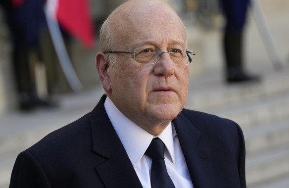 FILE - Lebanese Prime Minister Najib Mikati attends a joint press conference with French President Emmanuel Macron after their meeting at the Elysee Palace, in Paris, Sept. 24, 2021. Lebanon