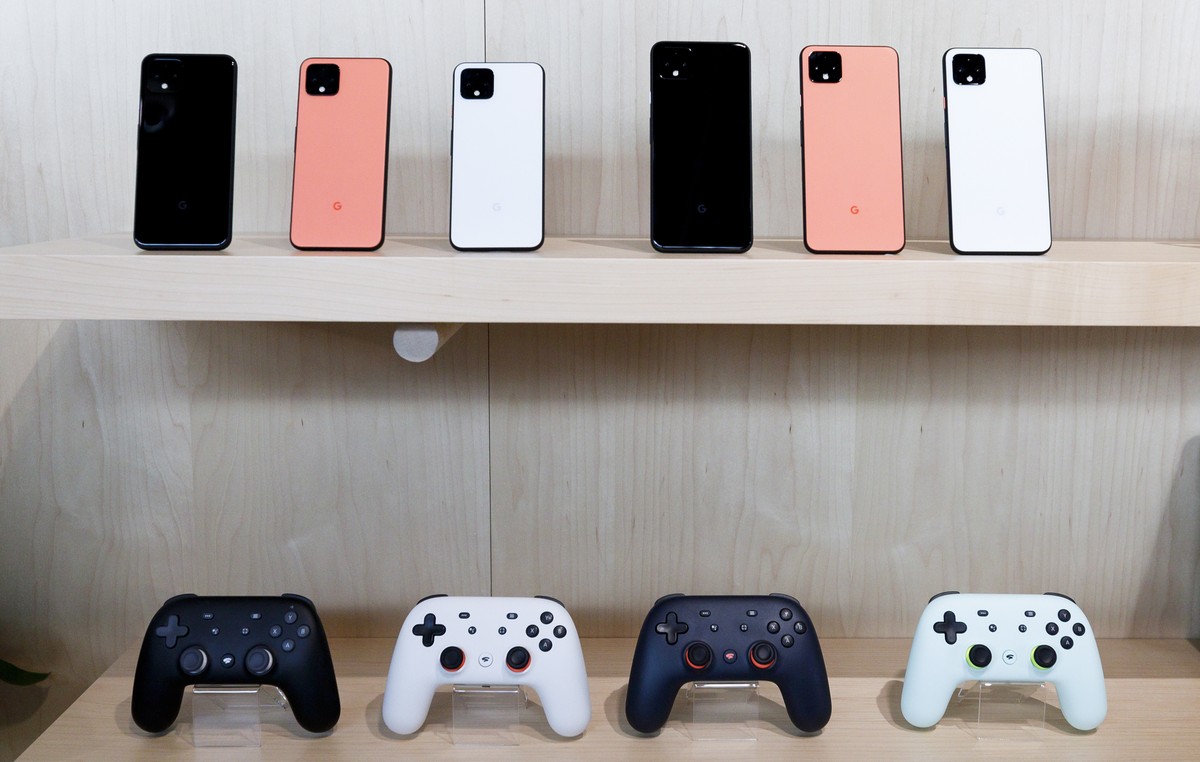 epa07922946 A display of the new Google Pixel 4 phones (top) and the Google Stadia cloud-based gaming system controllers, during a Google product launch event called 'Made by Google '19' ...