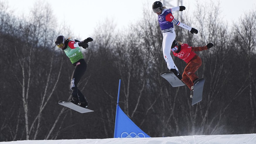 United States&#039; Lindsey Jacobellis (5) leads the pack on her way to winning the gold medal followed by France&#039;s Chloe Trespeuch (8) and Canada&#039;s Meryeta O&#039;Dine (3) during the women& ...