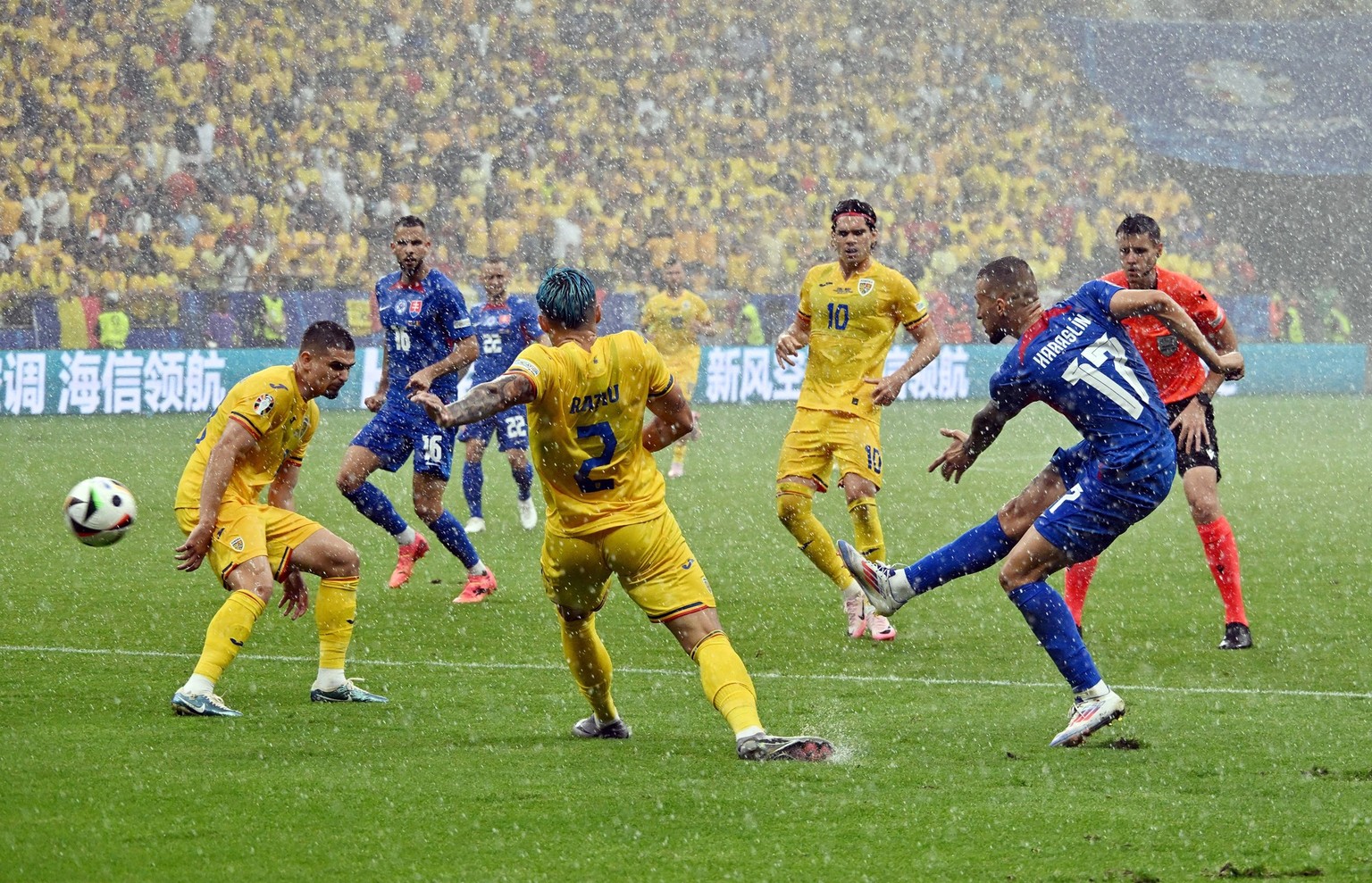 26.06.2024, xsltx, Fussball EM 2024, Slowakei - Rumänien emspor, v.l. Andrei Florin Ratiu Rumänien Rumaenien, Lukas Haraslin Slowakei DFL/DFB REGULATIONS PROHIBIT ANY USE OF PHOTOGRAPHS as IMAGE SEQUE ...
