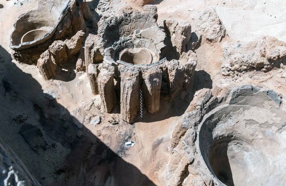 epa09012939 An undated handout photo made available by the Egyptian Department of Antiquities on 14 February 2021 shows the remains of a brewery uncovered in the ancient city of Abydos at Sohag Govern ...