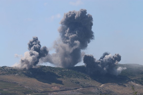 Israeli attacks on southern Lebanon continue NABATIEH, LEBANON - MAY 24: Smoke rises following the Israeli attack on Ali al-Tahir area despite the ceasefire in Nabatieh, Lebanon on May 24, 2026. Ramiz ...