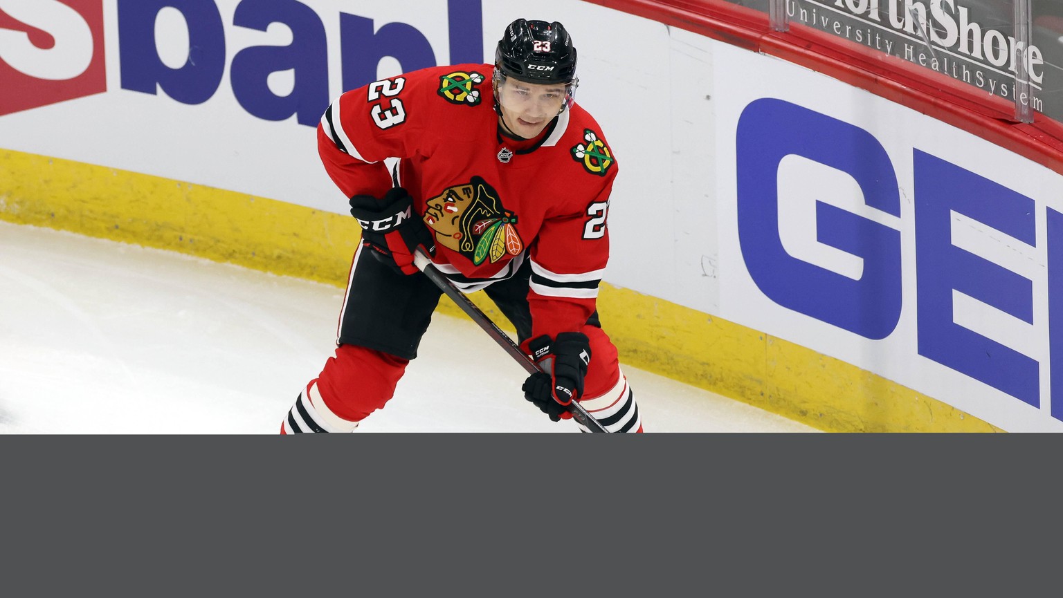 CHICAGO, IL - MARCH 07: Chicago Blackhawks left wing Philipp Kurashev (23) skates with the puck in action during a game between the Chicago Blackhawks and the Tampa Bay Lightning at the United Center  ...