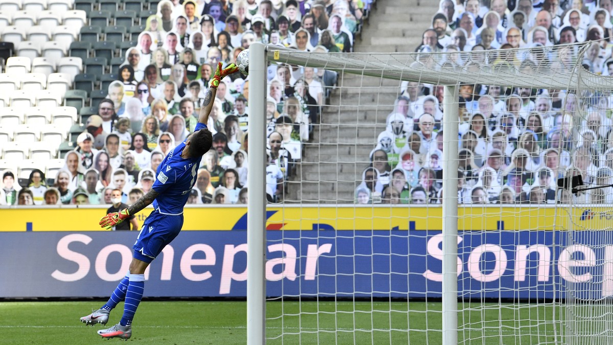 Union's goalkeeper Rafal Gikiewicz makes a save during the German Bundesliga soccer match between Borussia Moenchengladbach and Union Berlin in Moenchengladbach, Germany, Sunday, May 31, 2020. Th ...