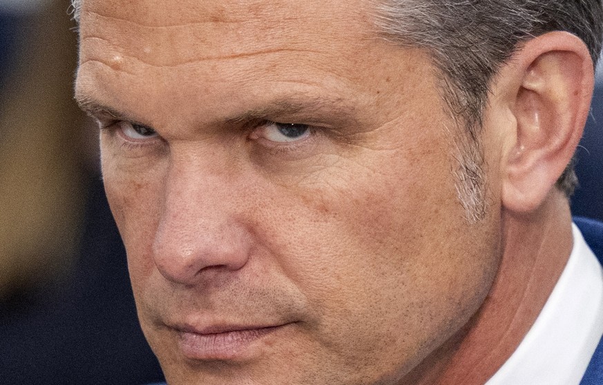 epaselect epa13207961 US Secretary of Defense Pete Hegseth looks on during a meeting with Austrailian Deputy Prime Minister and Minister of Defense Marles during a meeting at the Pentagon in Arlington ...