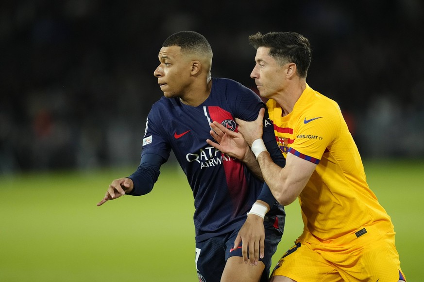 Paris Saint-Germain v FC Barcelona, Barca Quarter-final First Leg - UEFA Champions League 2023/24 Kylian Mbappe centre-forward of PSG and France and Robert Lewandowski centre-forward of Barcelona and  ...