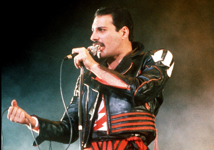 FILE - In this 1985 file photo, singer Freddie Mercury of the rock group Queen, performs at a concert in Sydney, Australia. Queen guitarist Brian May says an asteroid in Jupiter&#039;s orbit has been  ...