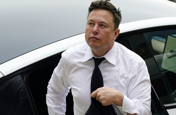 FILE - Elon Musk arrives at the justice center in Wilmington, Del., Tuesday, July 13, 2021. According to a filing posted late Wednesday, Dec. 14, 2022, by the U.S. Securities and Exchange Commission,  ...