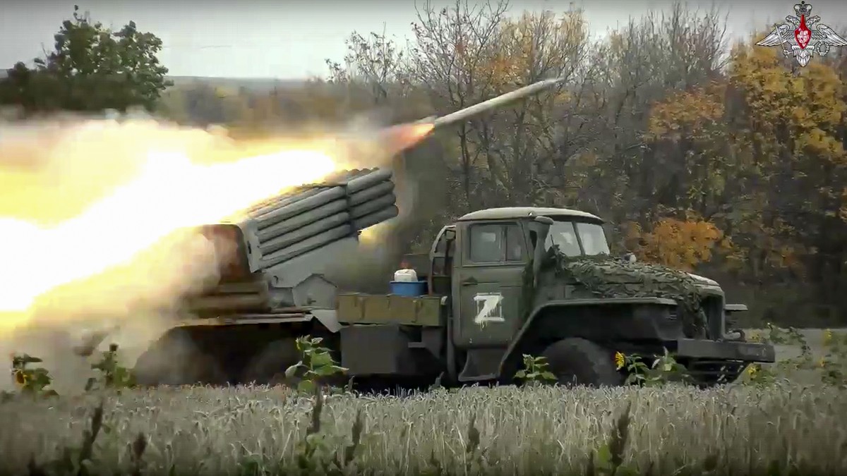 FILE - This handout photo taken from video released by Russian Defense Ministry Press Service on Oct. 4, 2022, shows a Grad multiple rocket launcher firing at Ukrainian troops at an undisclosed locati ...