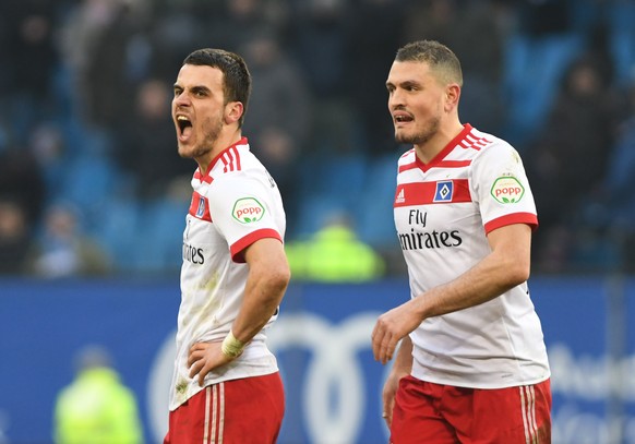 epa06577477 Hamburg&#039;s Filip Kostic (L) and Kyriakos Papadopoulos (R) react after the German Bundesliga soccer match between Hamburger SV and FSV Mainz 05 in Hamburg, Germany, 03 March 2018. EPA/D ...