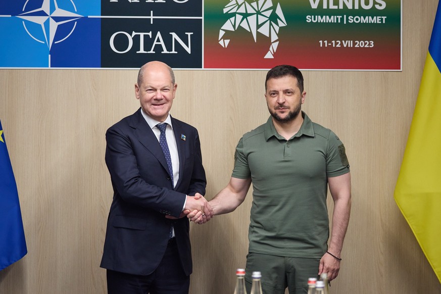 epa10741713 A handout photo made available by the Ukrainian Presidential Press Service on 12 July 2023 shows Ukraine&#039;s President Volodymyr Zelensky with Germany&#039;s Chancellor Olaf Scholz (L)  ...