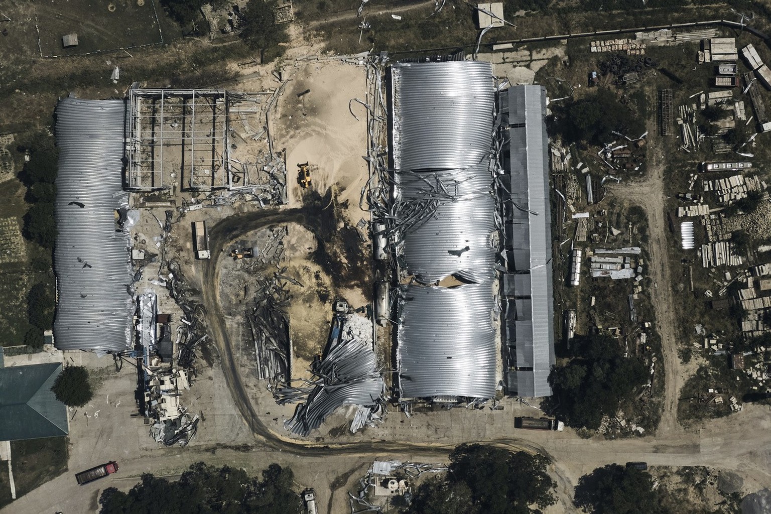 A farm storage building is badly damaged after a Russian attack in the Odessa region, Ukraine, Friday, July 21, 2023. A barrage of rockets injured two people, damaged equipment and destroyed 100 metric…