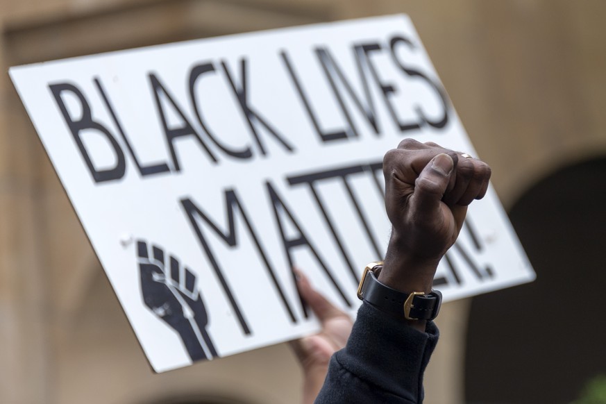 Around 5000 people take part at the Black Lives Matter rally in Basel, Switzerland, Saturday, June 6, 2020 to protest against the recent killing of George Floyd by police officers in Minneapolis, USA, ...