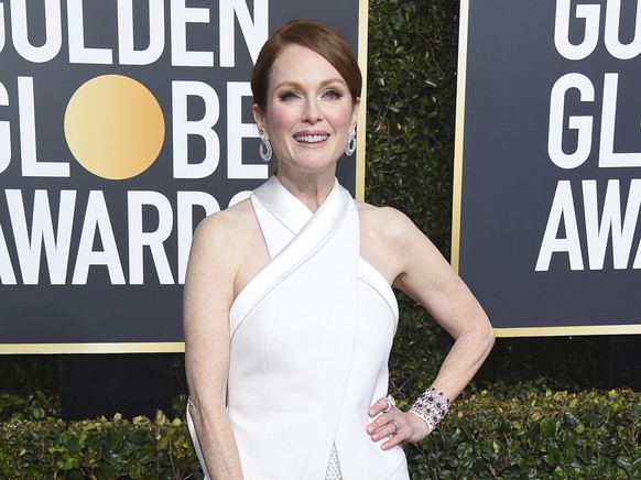 FILE - In this Jan. 6, 2019 file photo, Julianne Moore arrives at the 76th annual Golden Globe Awards in Beverly Hills, Calif. Moore has helped New York Gov. Andrew Cuomo’s administration unveil the g ...