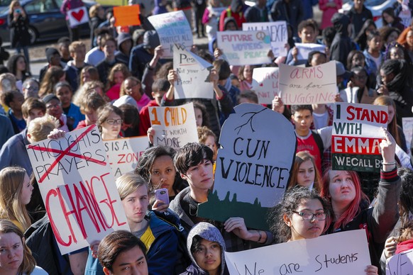 epa06603787 Druid Hills High School students participate in the National School Walkout in Atlanta, Georgia, USA, 14 March 2018. The protest across the US comes one month after the school shooting at  ...