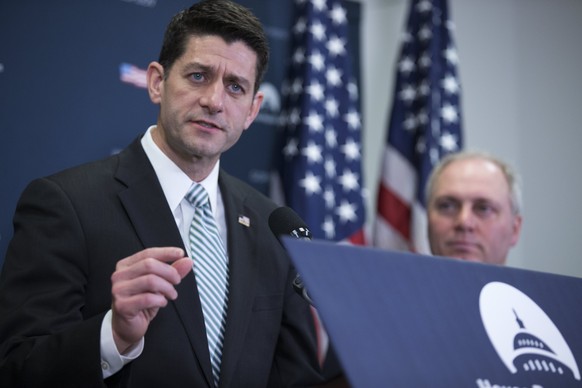 epa05887830 Speaker of the House Paul Ryan (L), with House Majority Whip Steve Scalise (R), delivers remarks following the House Republican conference meeting in the US Capitol in Washington, DC, USA, ...