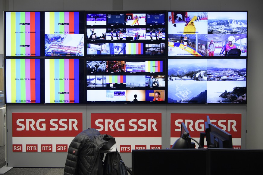 Screens of Swiss broadcaster SRG SSR are pictured during a media visit of the International Broadcasting Center (IBC) the day of the opening of the XXIII Winter Olympics 2018 in Pyeongchang, South Kor ...