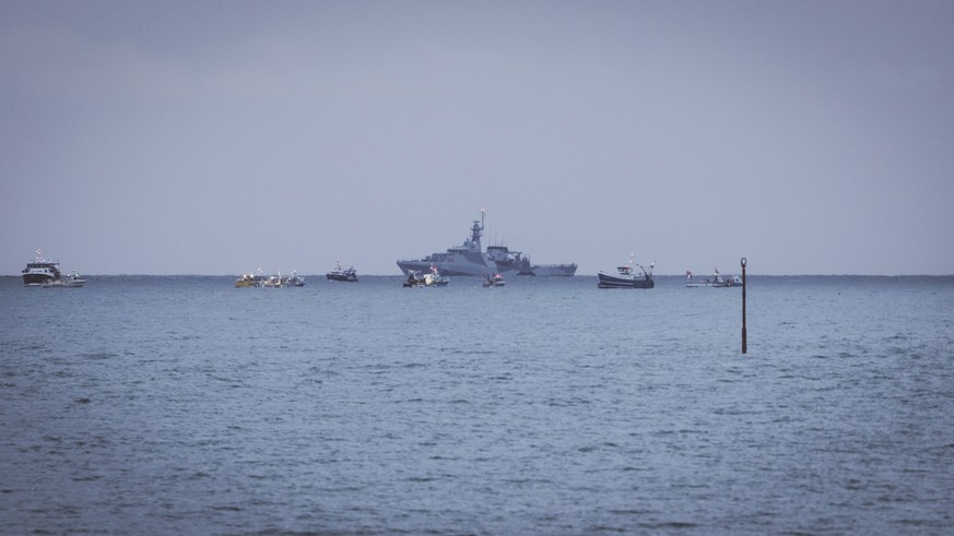 Fishing vessels at sea seen from the coast of Jersey, Thursday, May 6, 2021. French fishermen angry over loss of access to waters off their coast have gathered their boats in protest off the English C ...