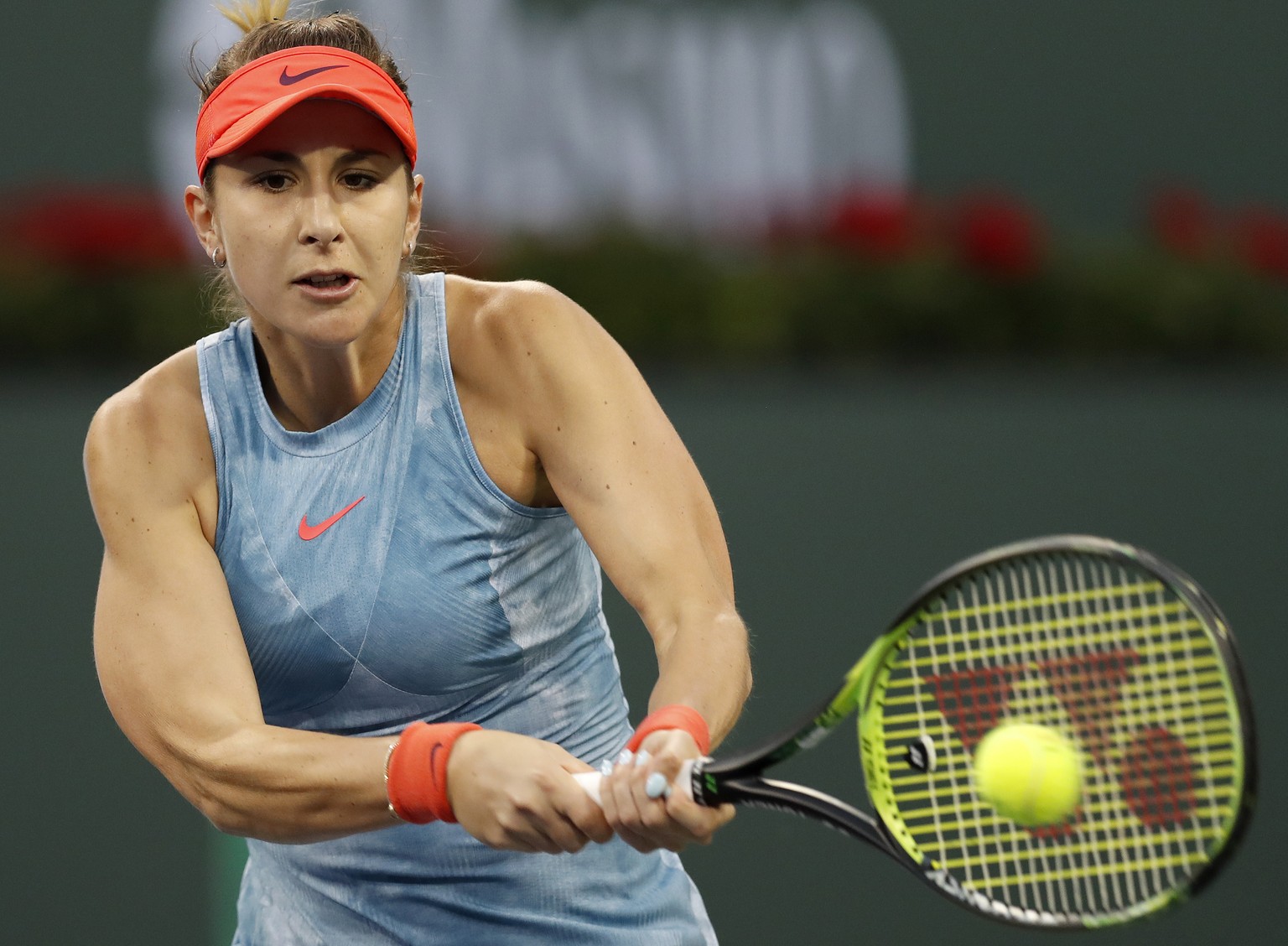 epa07432766 Belinda Bencic of Switzerland in action against Naomi Osaka of Japan during the BNP Paribas Open tennis tournament at the Indian Wells Tennis Garden in Indian Wells, California, USA, 12 Ma ...