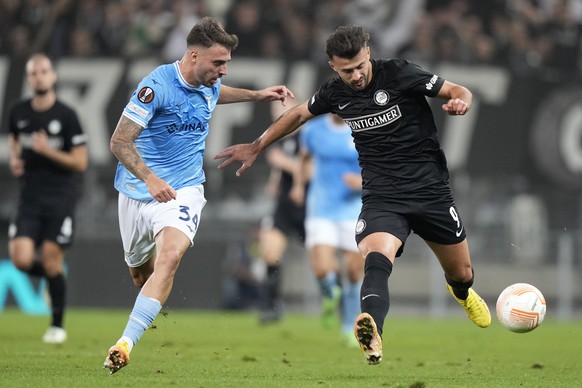 Lazio&#039;s Mario Gila, left, and Sturm&#039;s Albian Ajeti vie for the ball during the Europa League group F soccer match between Sturm Graz and Lazio at the Merkur Arena in Graz, Austria, Thursday, ...