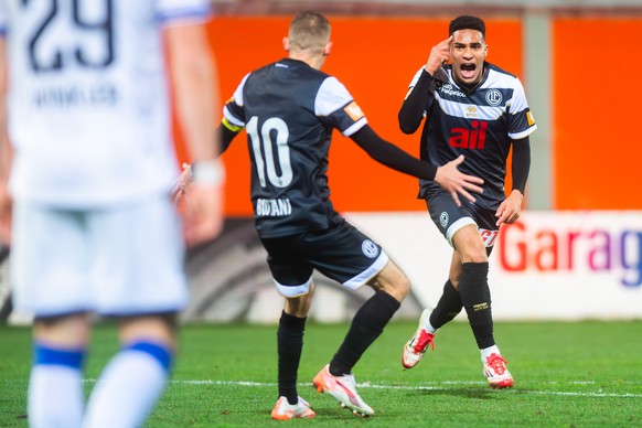 Yanis Cimignani (LUG), right, celebrates the 1-0 goal with Mattia Bottani (LUG), during the Super League soccer match FC Lugano against FC Luzern at the Cornaredo Stadium in Lugano, Saturday, February ...