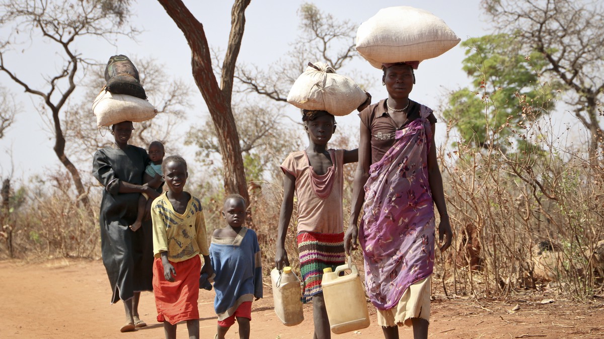File - After walking for days, a refugee family arrives in Yida, South Sudan, Feb. 20, 2018. South Sudan's president on Wednesday, Feb. 22, 2023, urged the country's more than 2 million refu ...
