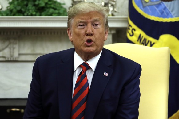 President Donald Trump speaks as he and first lady Melania Trump meet with Australian Prime Minister Scott Morrison and his wife Jenny Morrison in the Oval Office of the White House, Friday, Sept. 20, ...