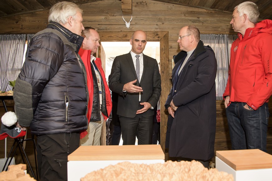 Switzerland&#039;s Federal Councillor and President Alain Berset, center, talks with Prince Albert II of Monaco, 2nd right, and president of bid candidacy Sion 2026, Hans Stoeckli, vice-president of b ...