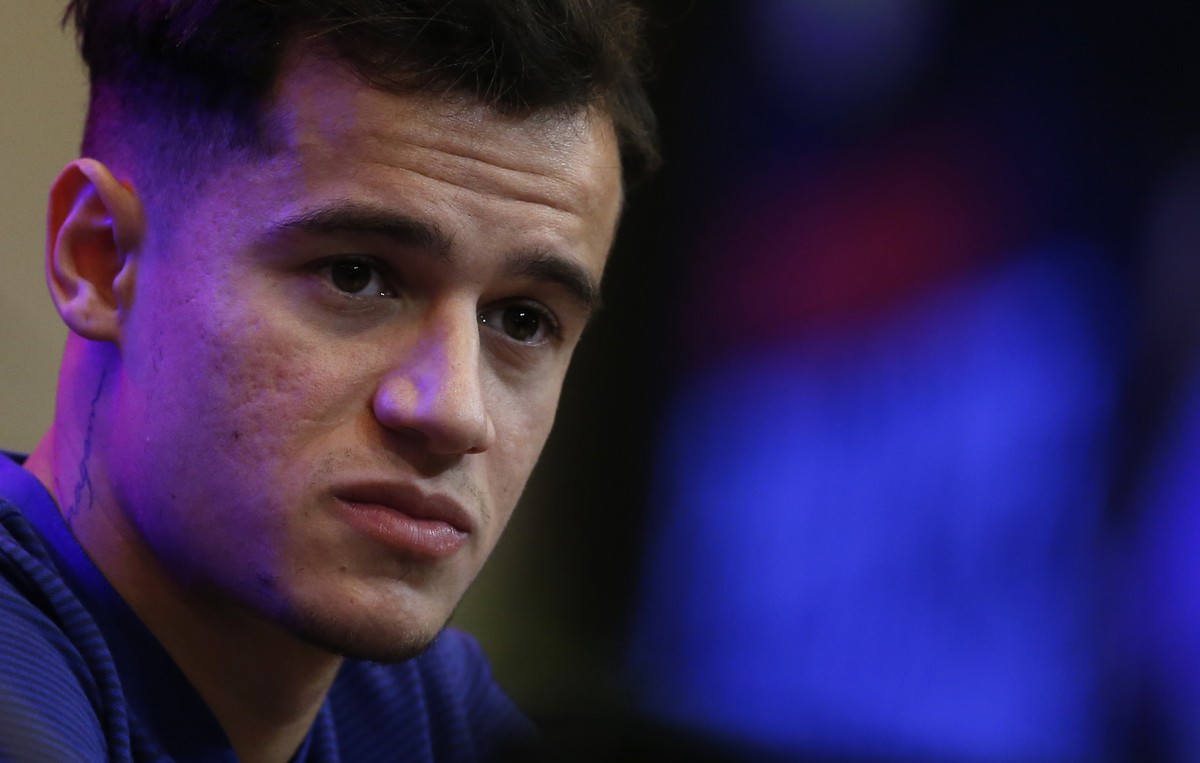 Barcelona's new signing Brazilian Philippe Coutinho attends his official presentation at the Camp Nou stadium in Barcelona, Spain, Monday, Jan. 8, 2018. Coutinho is joining Barcelona after Liverp ...