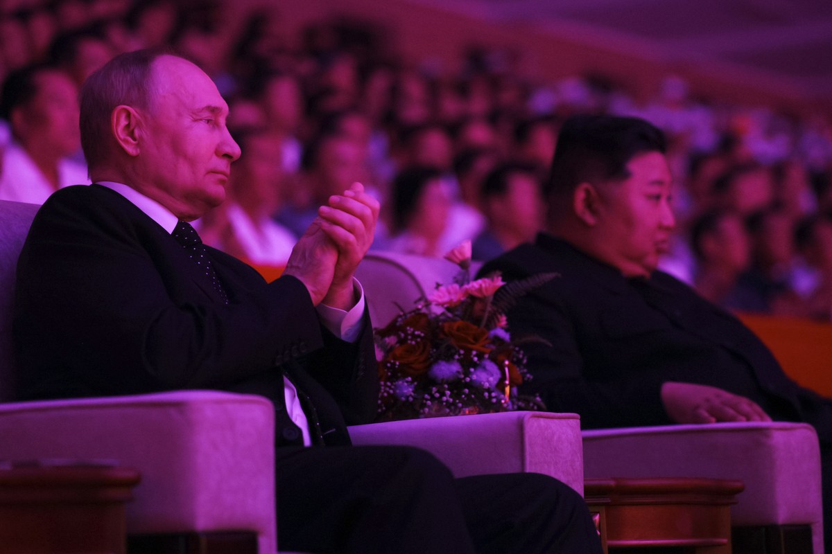Russian President Vladimir Putin, left, and North Korea's leader Kim Jong Un attend a gala concert in Pyongyang, North Korea, on Wednesday, June 19, 2024. (Gavriil Grigorov, Sputnik, Kremlin Pool ...