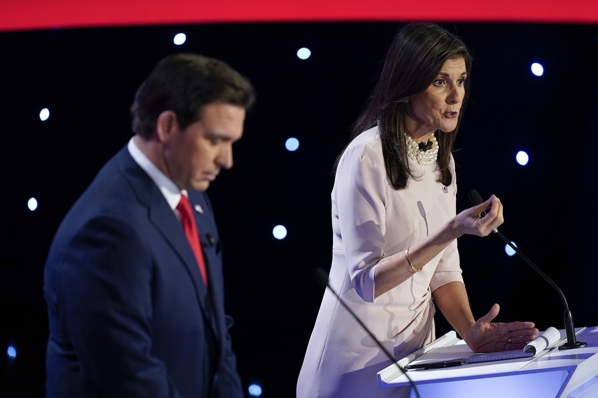 Former UN Ambassador Nikki Haley, right, speaking at the CNN Republican presidential debate with Florida Gov. Ron DeSantis, left, at Drake University in Des Moines, Iowa, Wednesday, Jan. 10, 2024. (AP ...