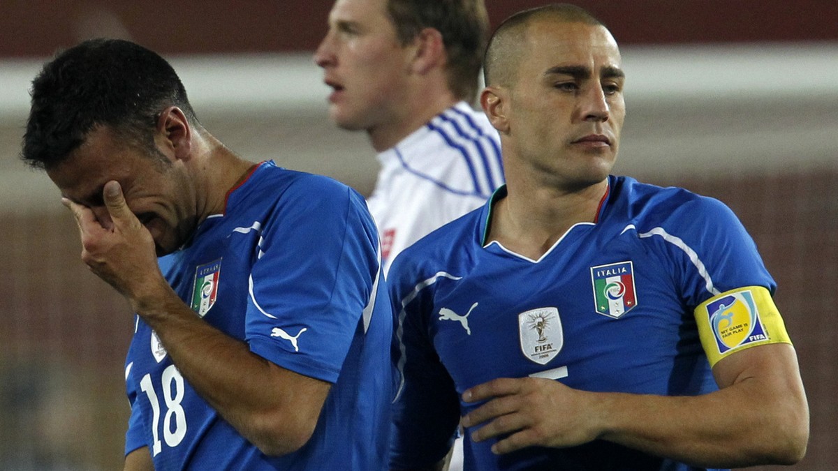 Italy's Fabio Quagliarella, left, cries next to Italy's Fabio Cannavaro at the end of the World Cup group F soccer match between Slovakia and Italy at Ellis Park Stadium in Johannesburg, Sou ...