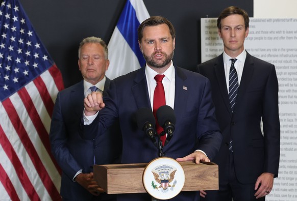 epa12470321 US Vice President JD Vance speaks during a media briefing at the US-led Civil-Military Coordination Center (CMCC) in Kiryat Gat, southern Israel, 21 October 2025. EPA/ABIR SULTAN